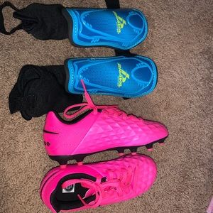 Girls soccer cleats and shin guards
